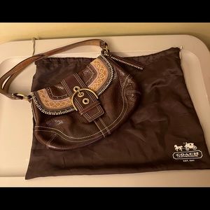 Coach handbag. Good condition. Brown with gold and purple detail